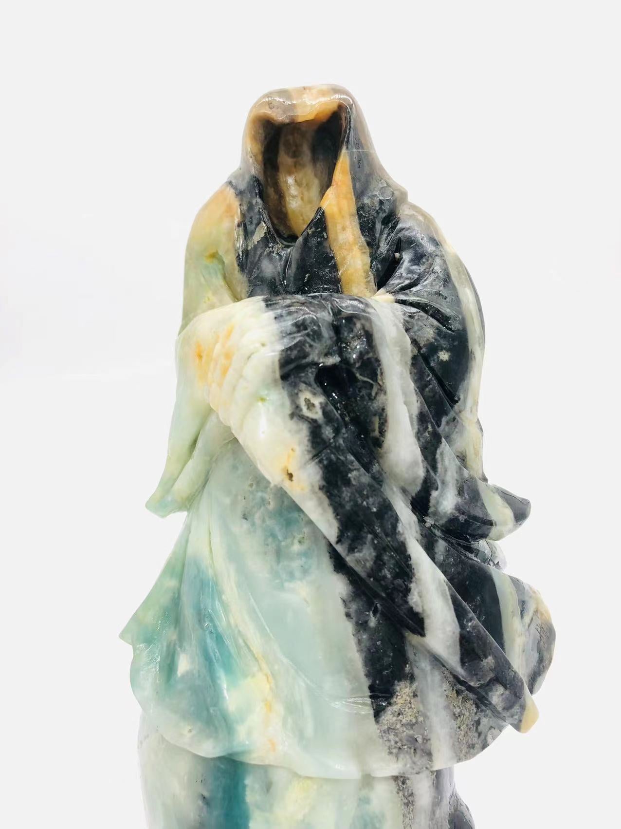 Caribbean skull with ghost carving