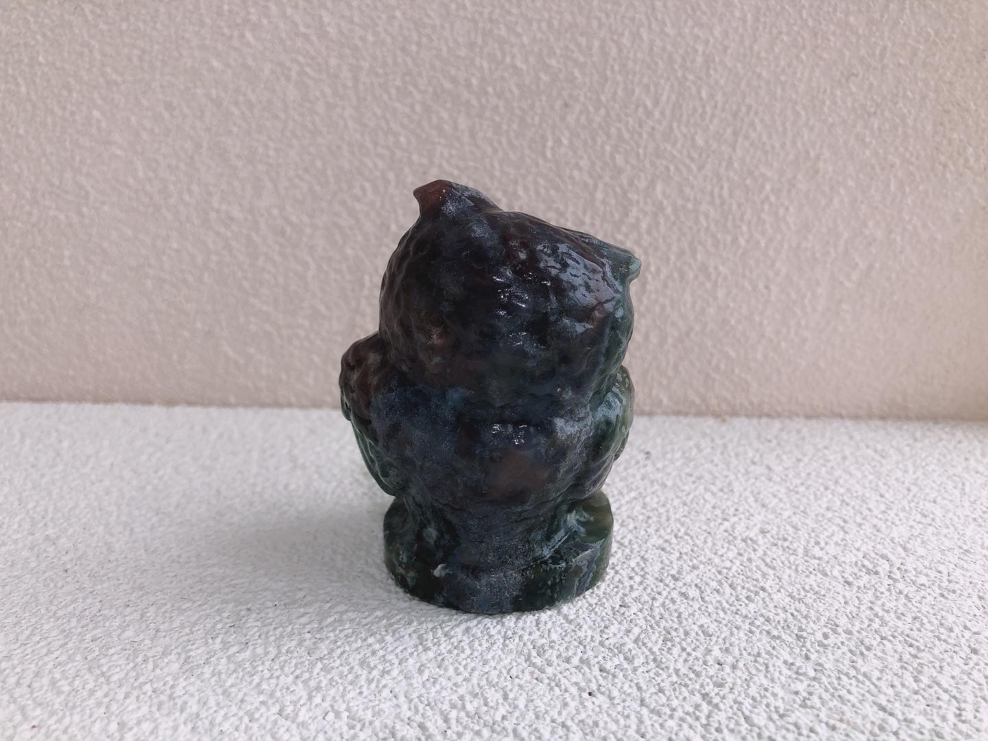 Moss agate owl carving