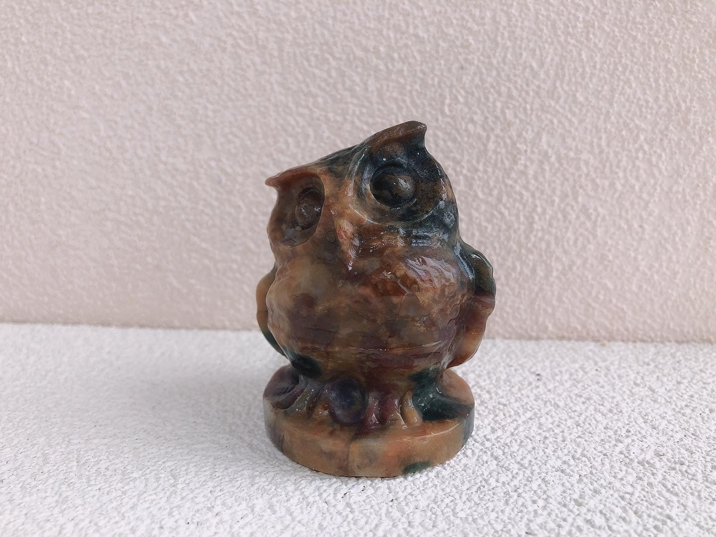 Moss agate owl carving