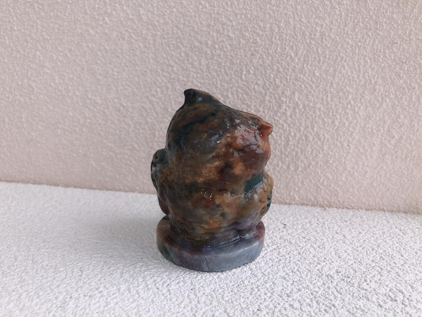 Moss agate owl carving