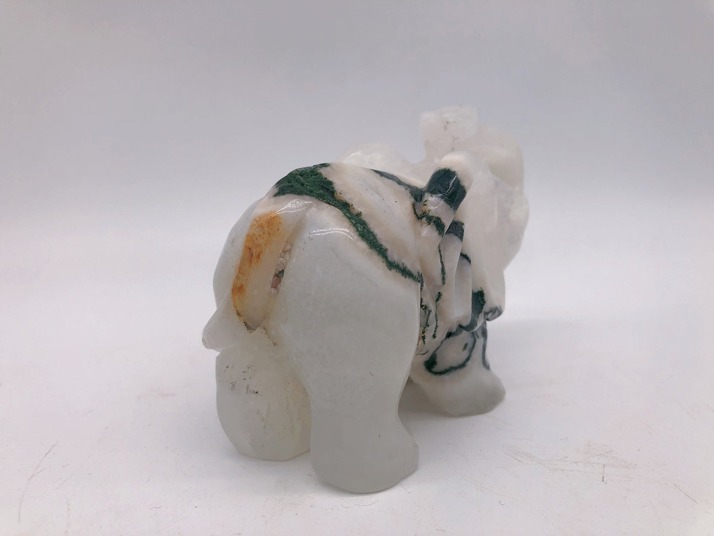 Moss agate elephant carving