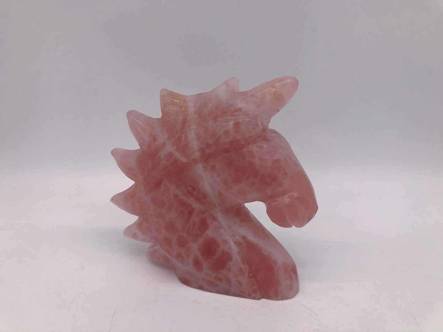Rose quartz unicorn carving