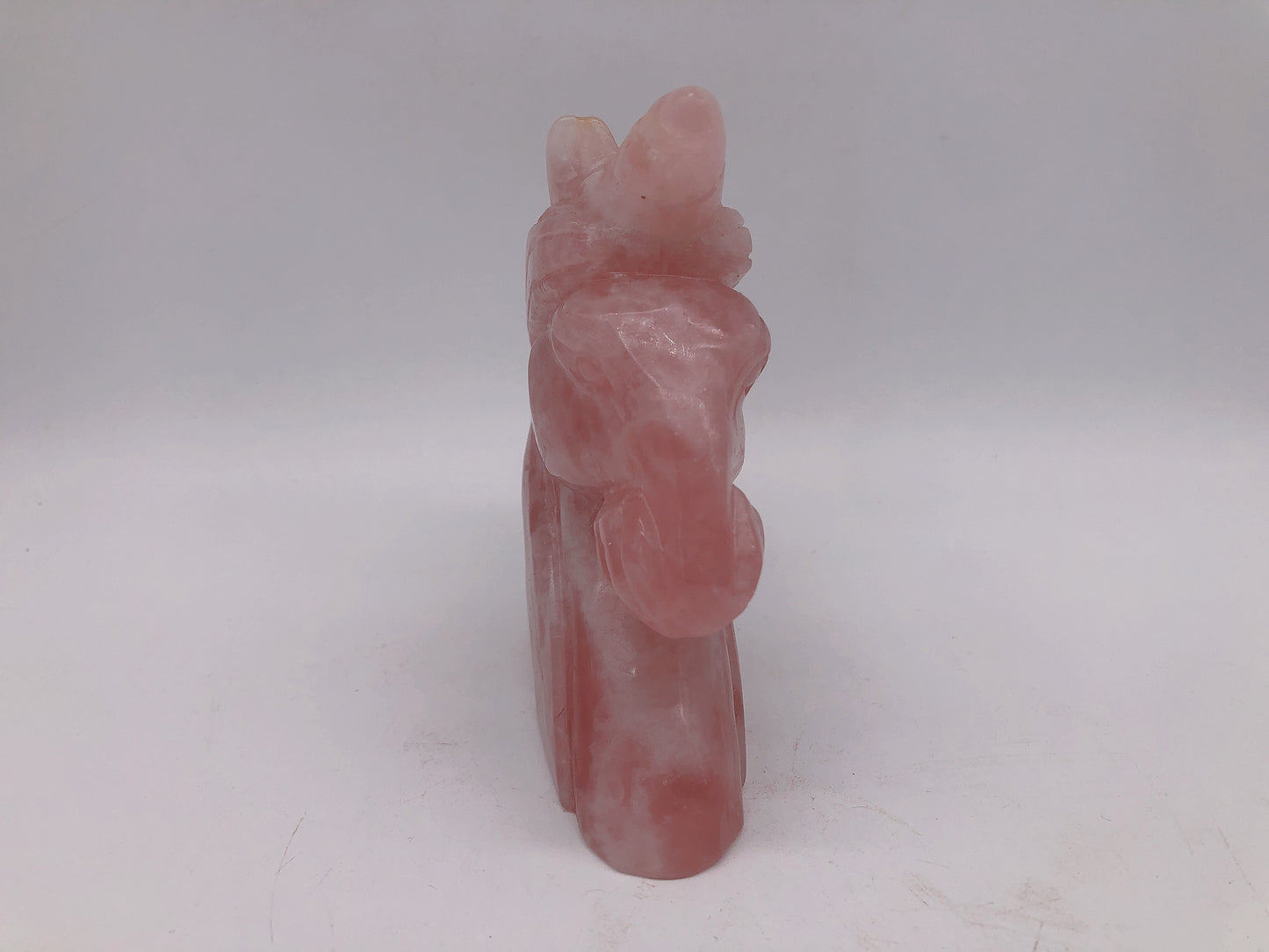 Rose quartz unicorn carving