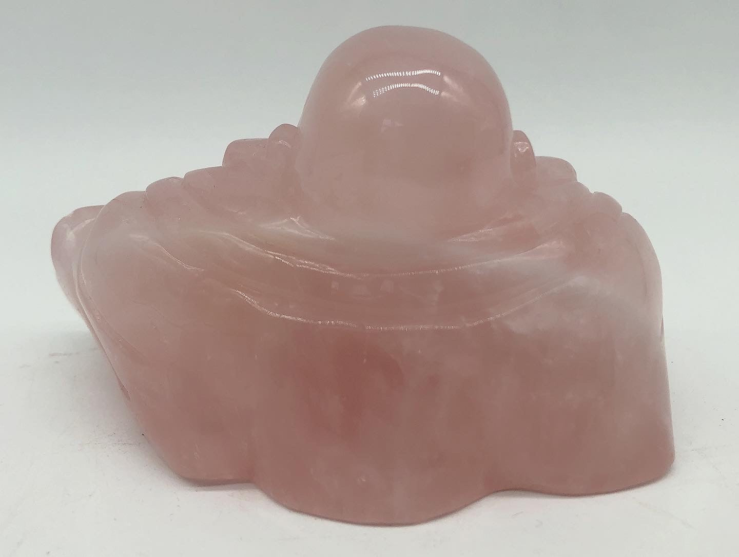 Rose quartz buddha carving