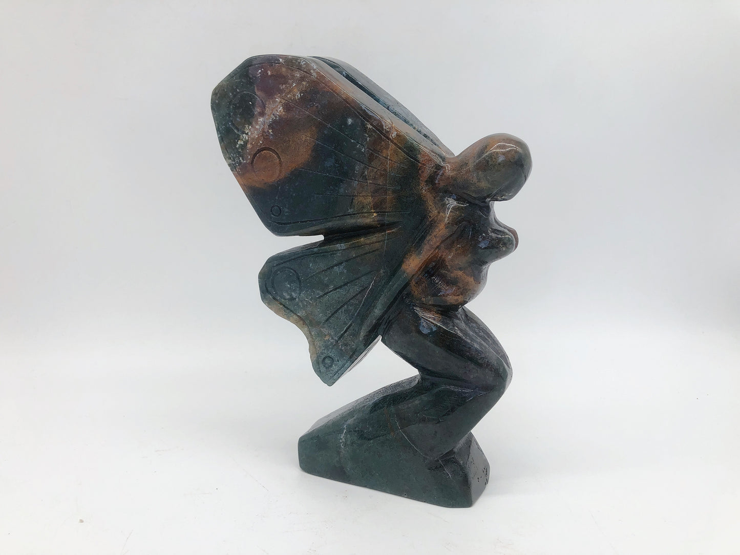 Moss agate fairy carving