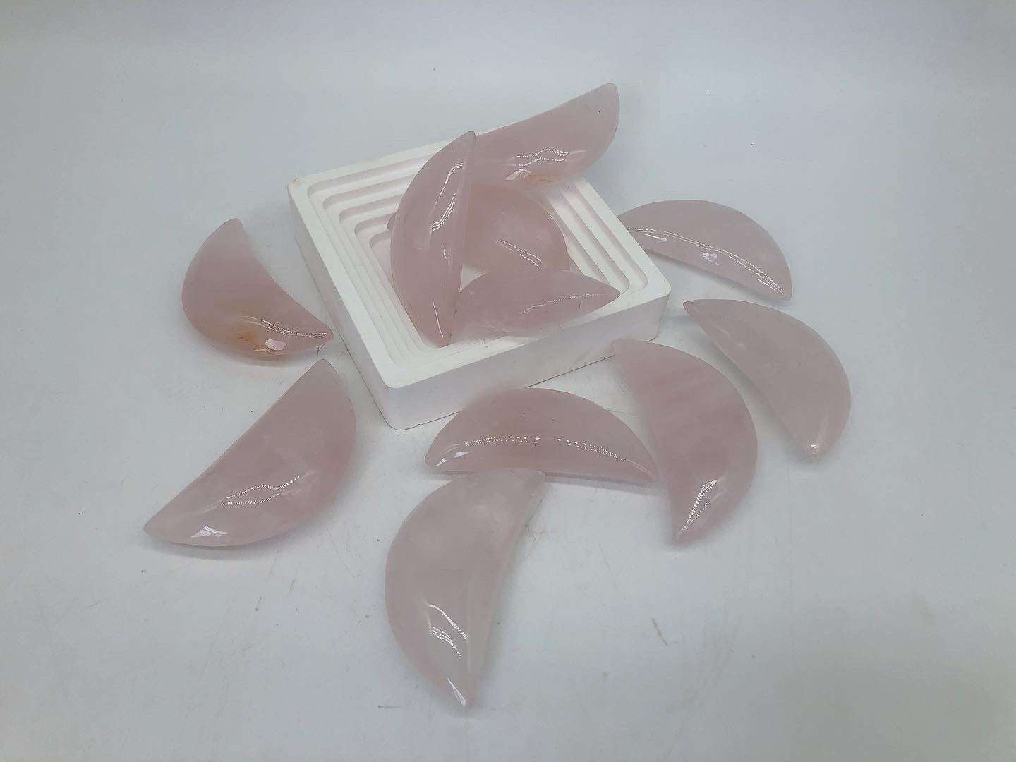 Rose quartz moon carving