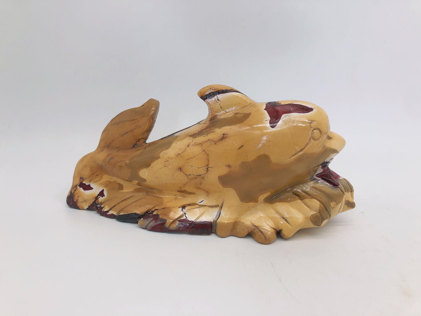 Mookite dolphin carving