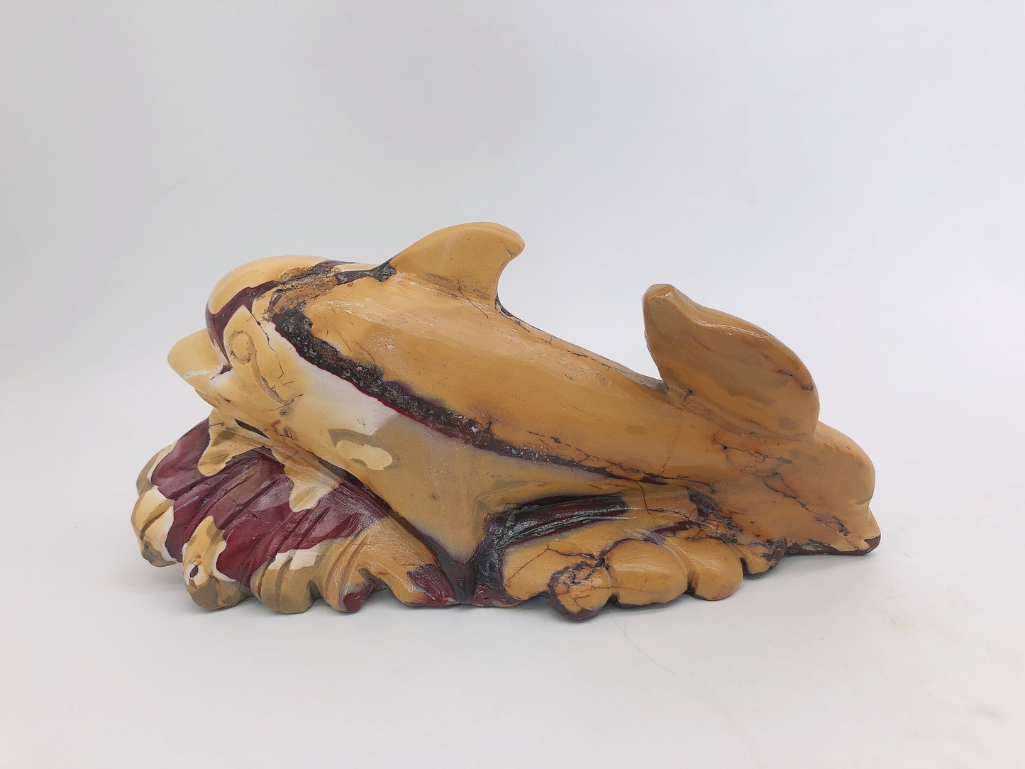 Mookite dolphin carving