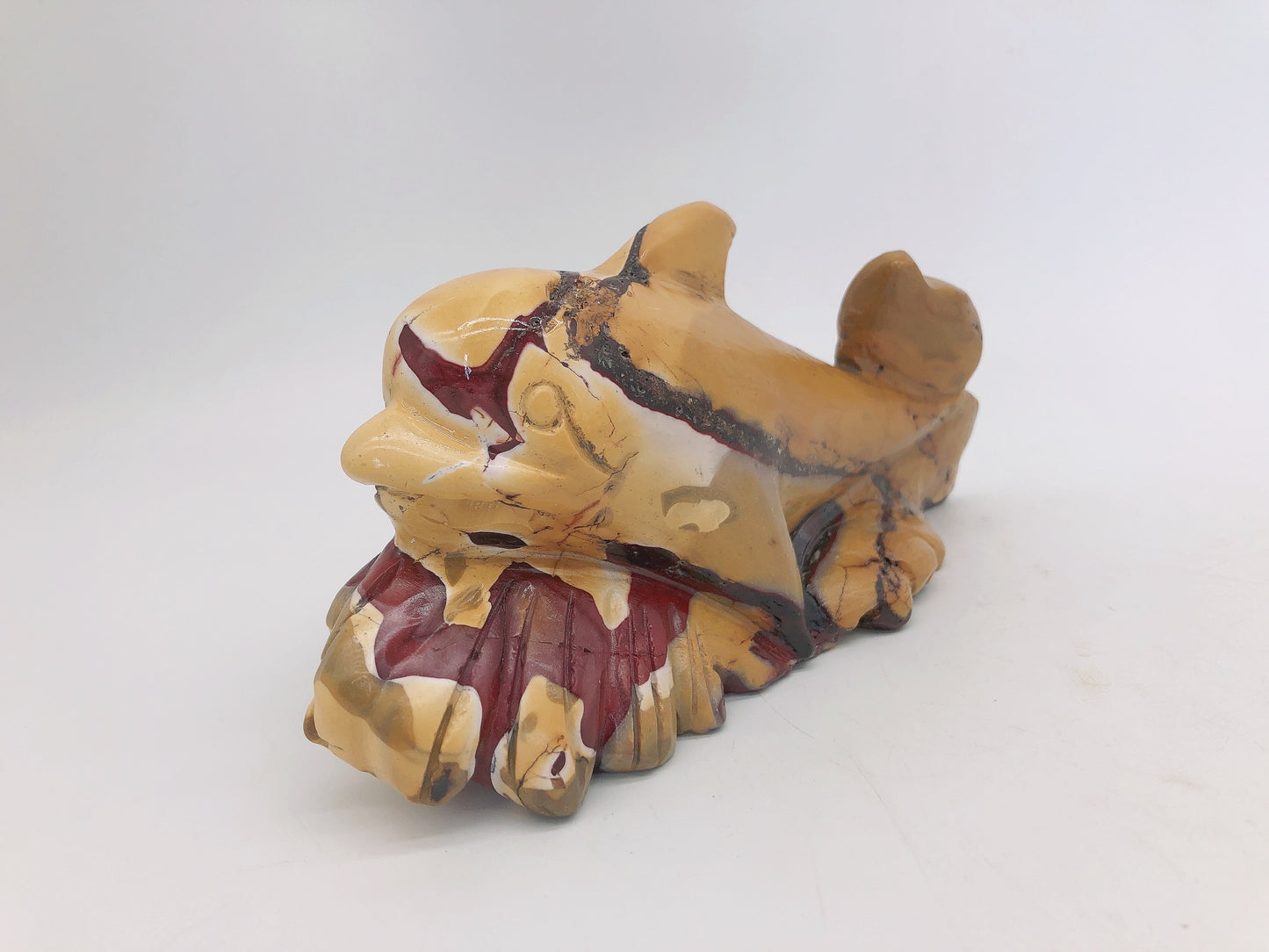 Mookite dolphin carving