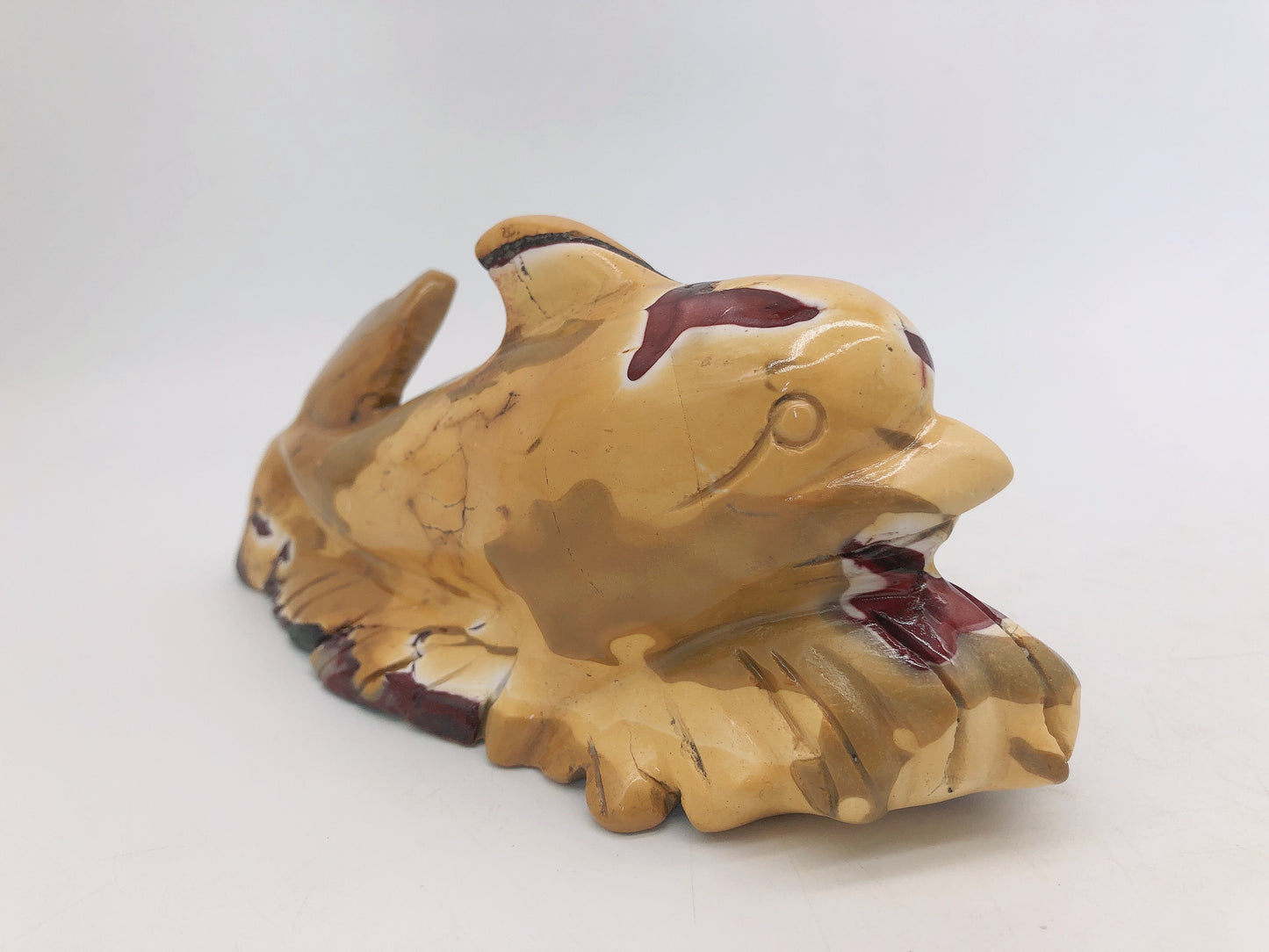 Mookite dolphin carving