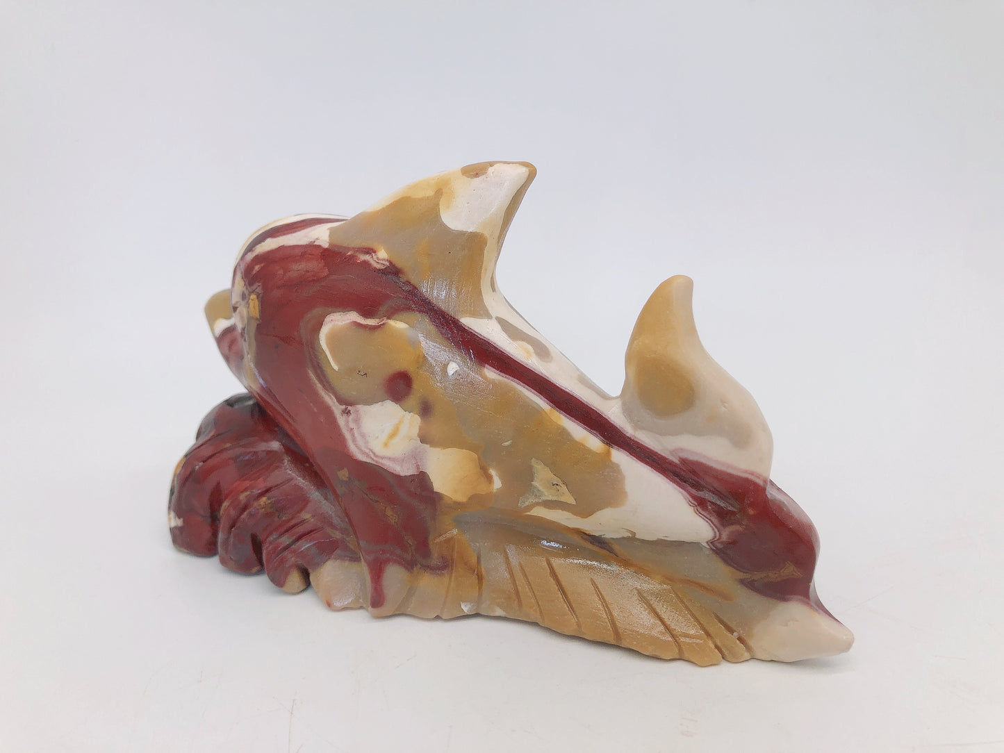 Mookite dolphin carving