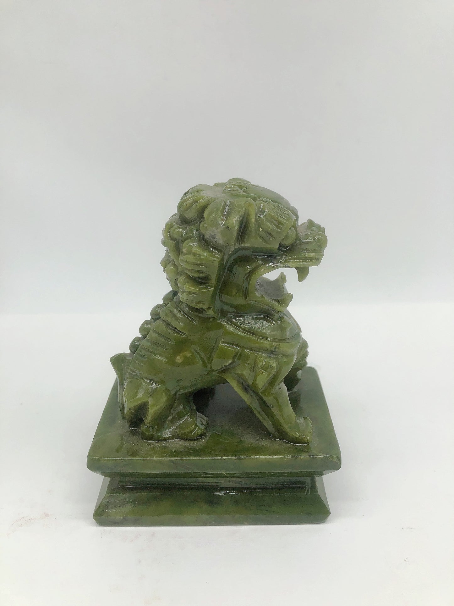 Jade lion carving