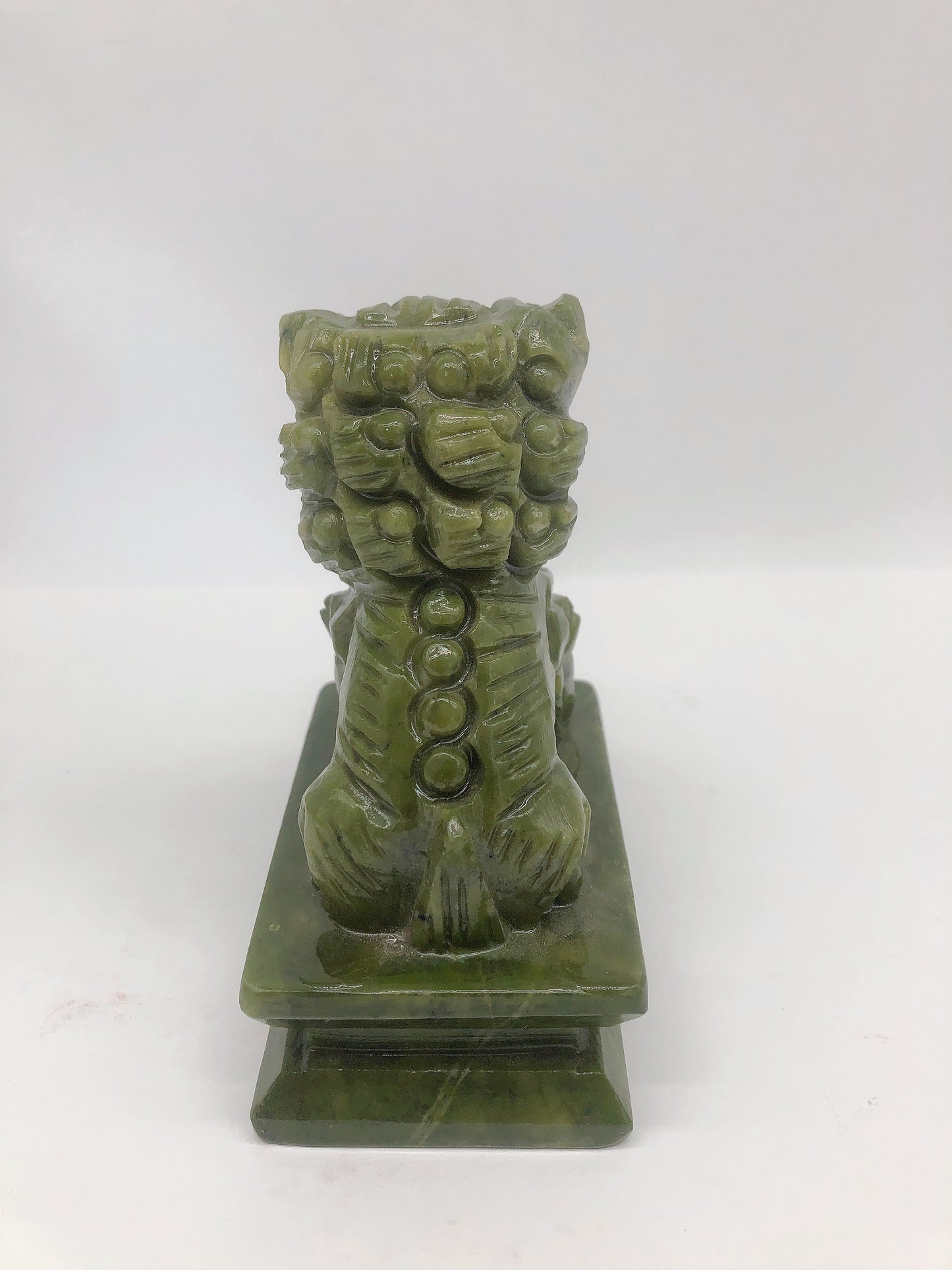 Jade lion carving