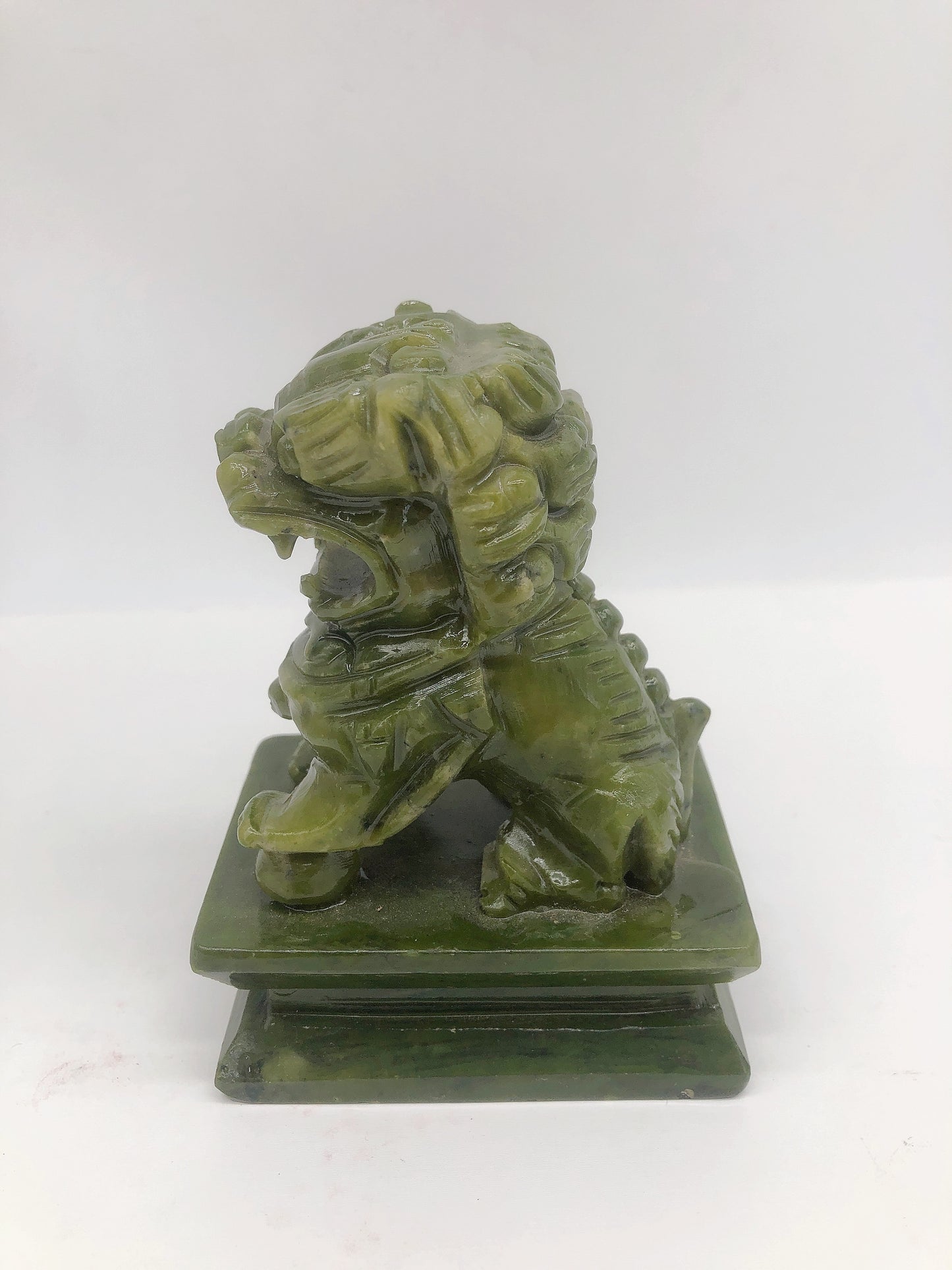 Jade lion carving