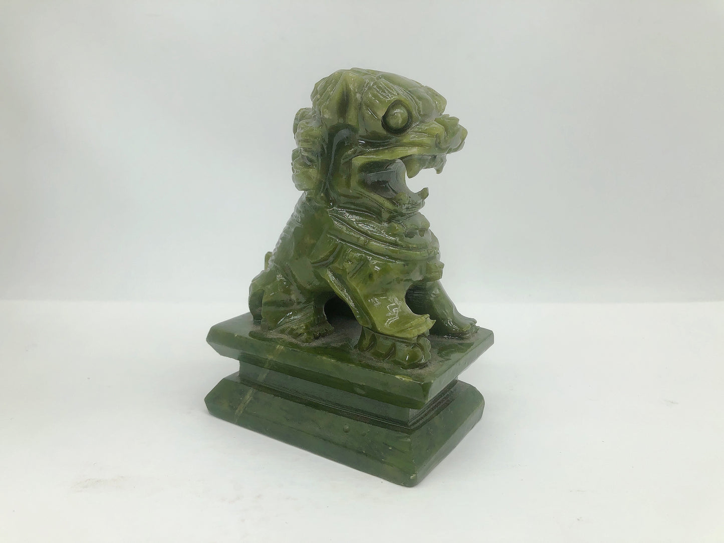 Jade lion carving