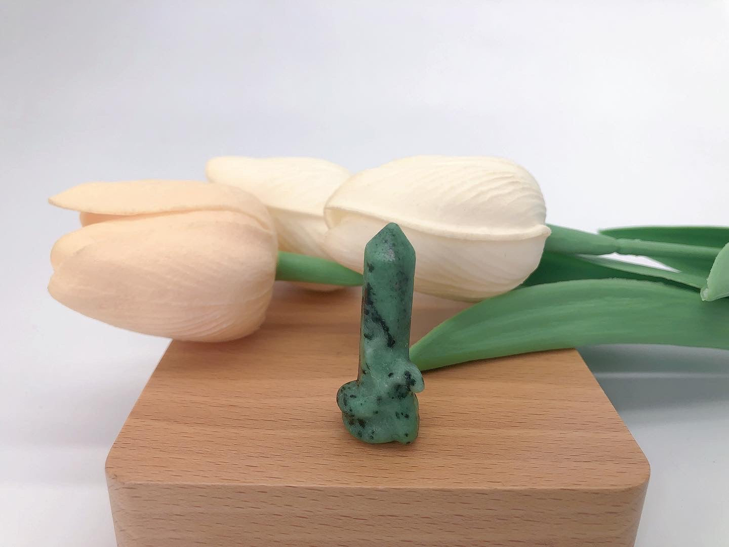 Mini tower with snake carving