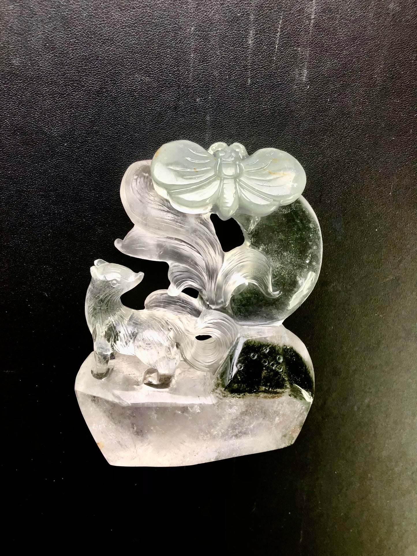 Garden quartz fox with butterfly carving