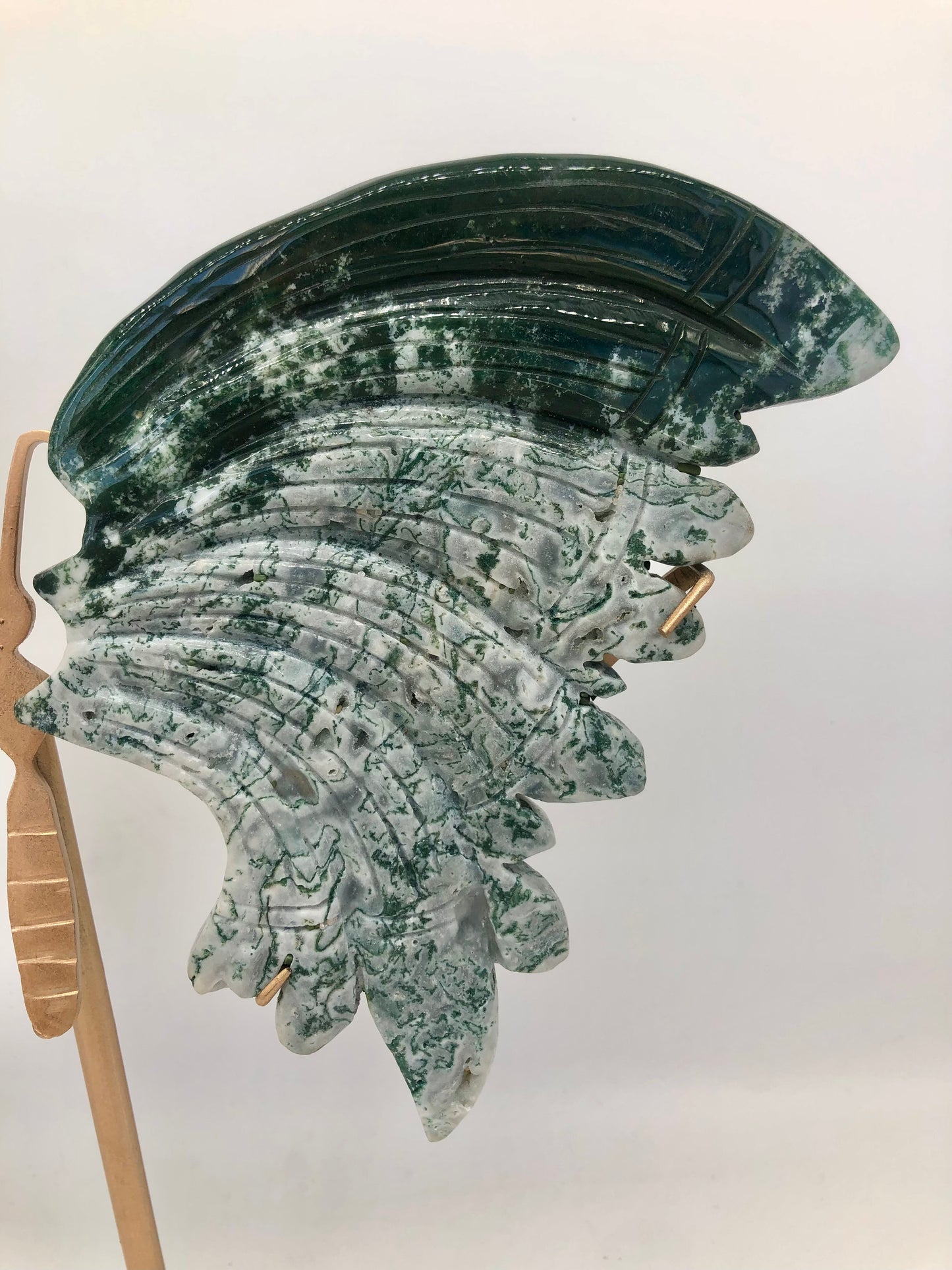 Moss agate wing carving