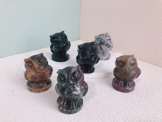 Moss agate owl carving