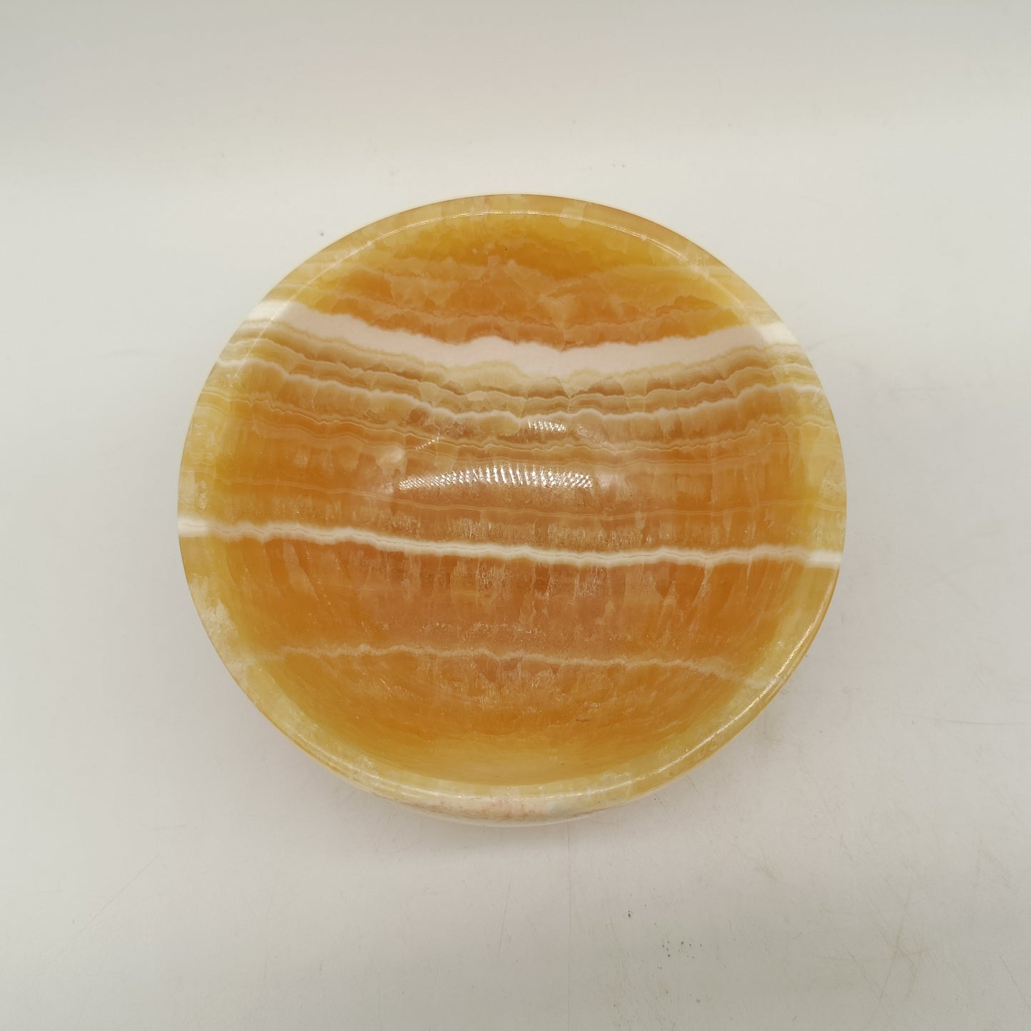 Orange calcite bowl