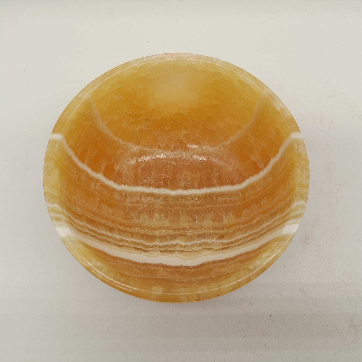 Orange calcite bowl