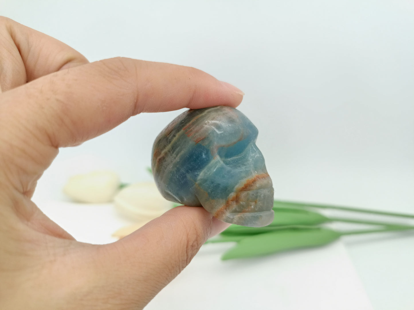 Blue onyx skull carving