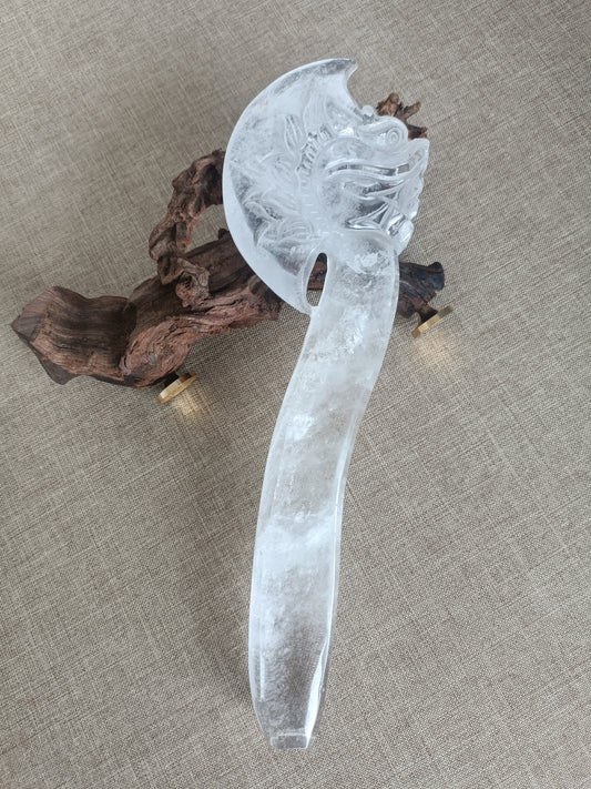 Clear quartz axe carving