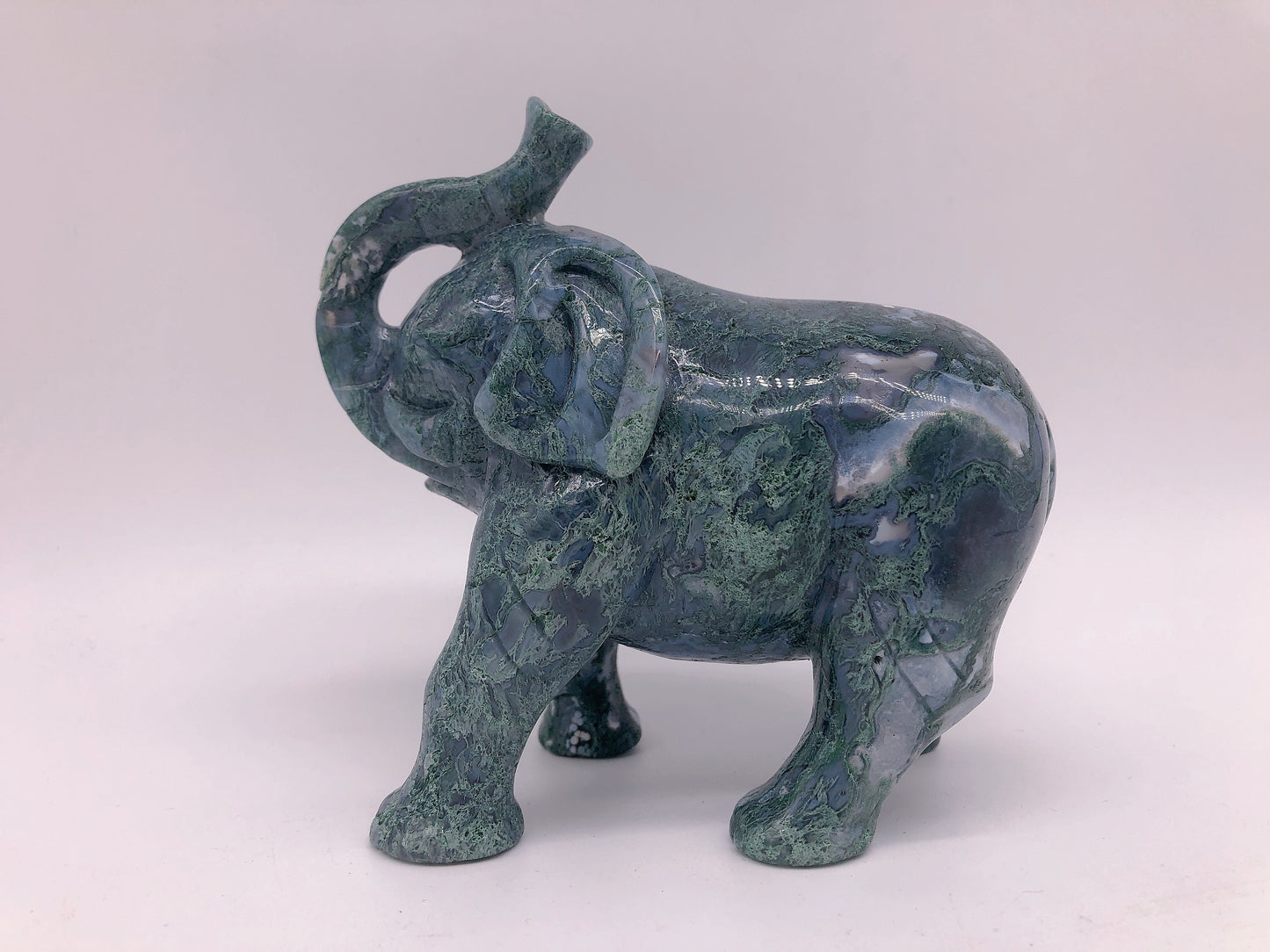 Moss agate elephant carving