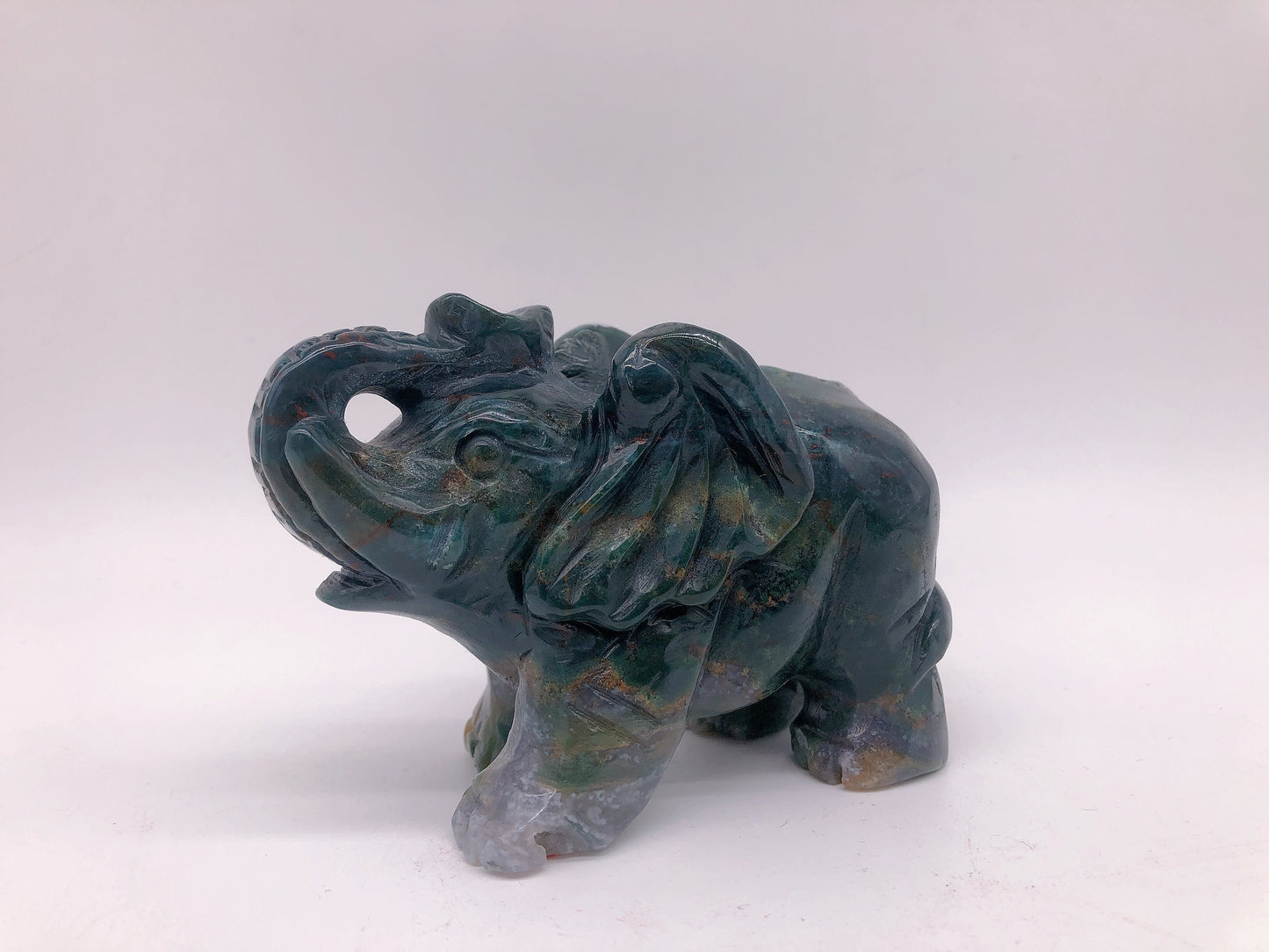 Moss agate elephant carving