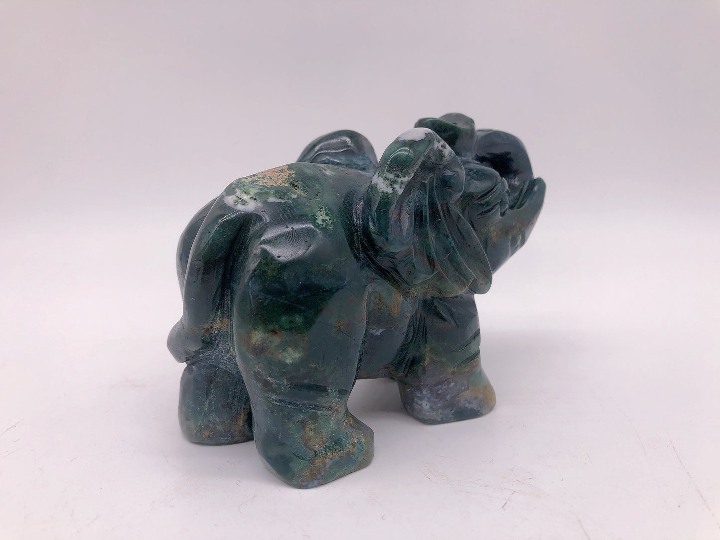 Moss agate elephant carving