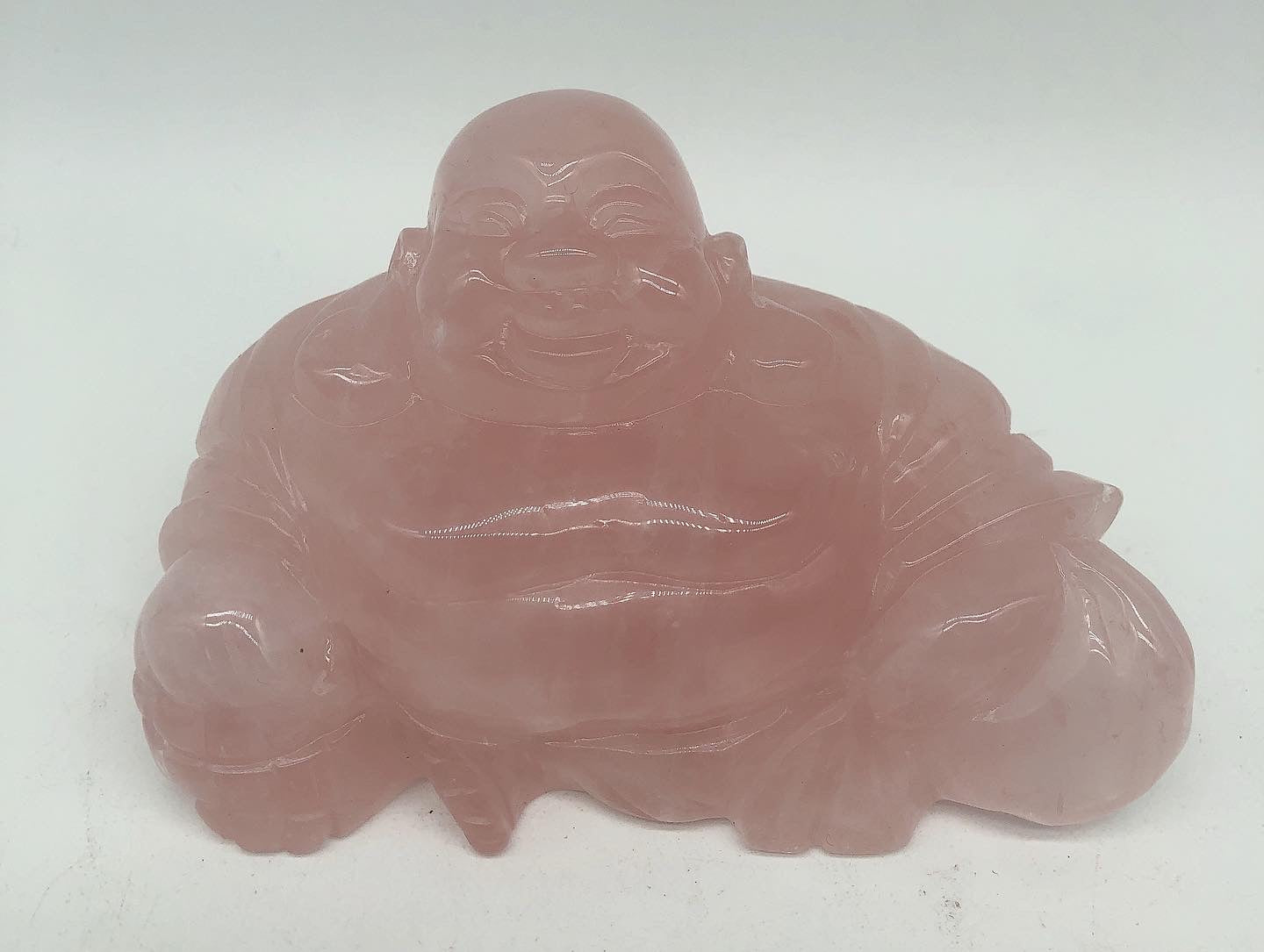 Rose quartz  buddha carving