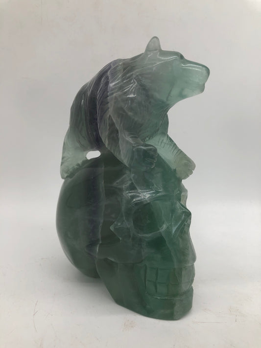 Fluorite skull with bear