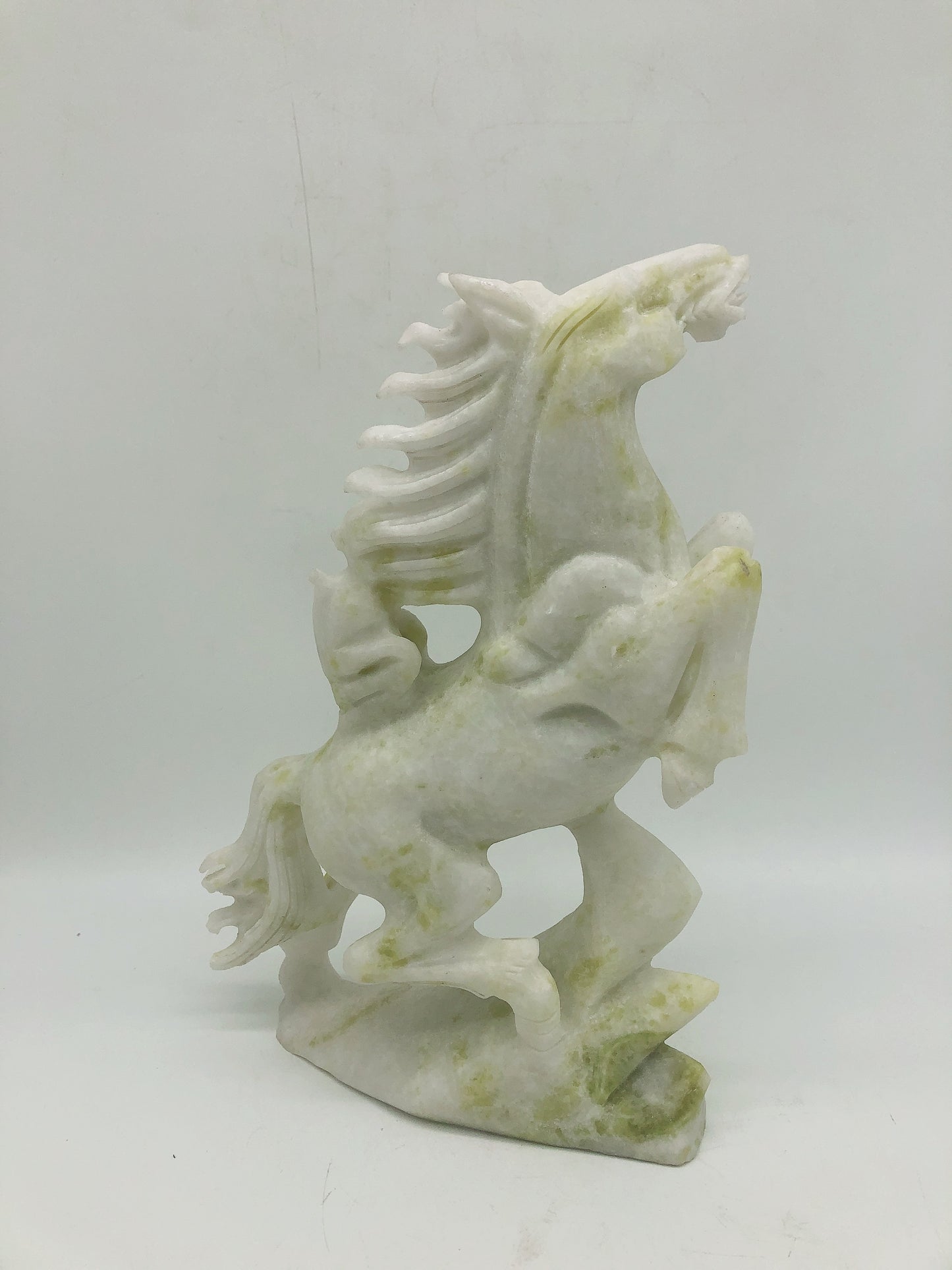 Lemon jade horse with monkey carving