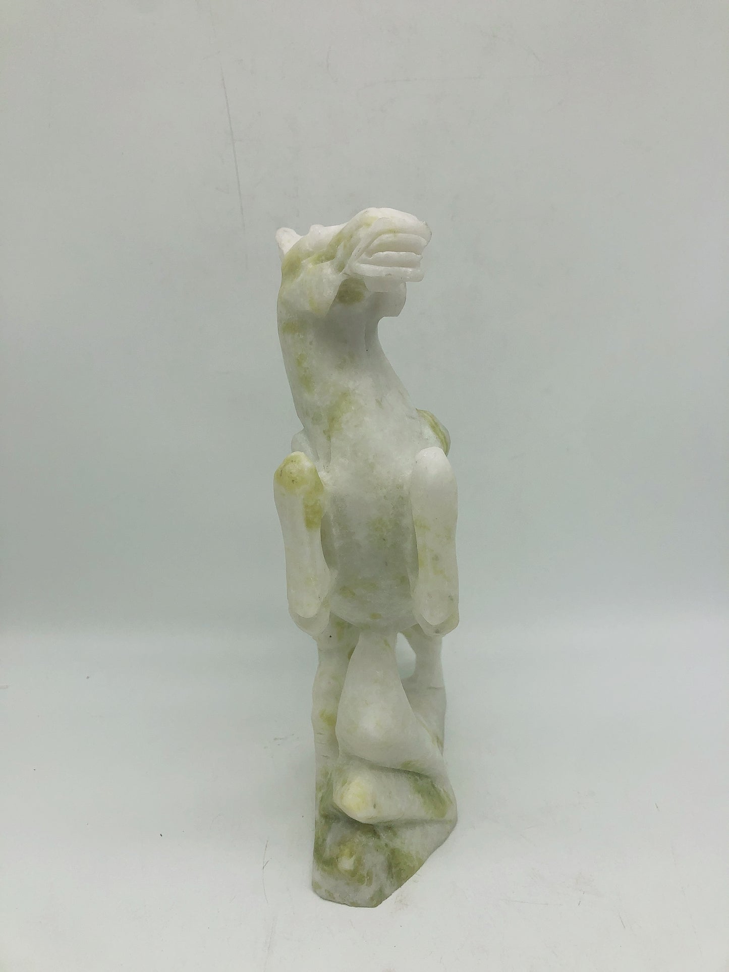 Lemon jade horse with monkey carving