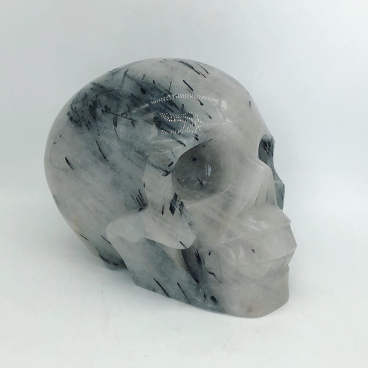 Black toumaline skull carving