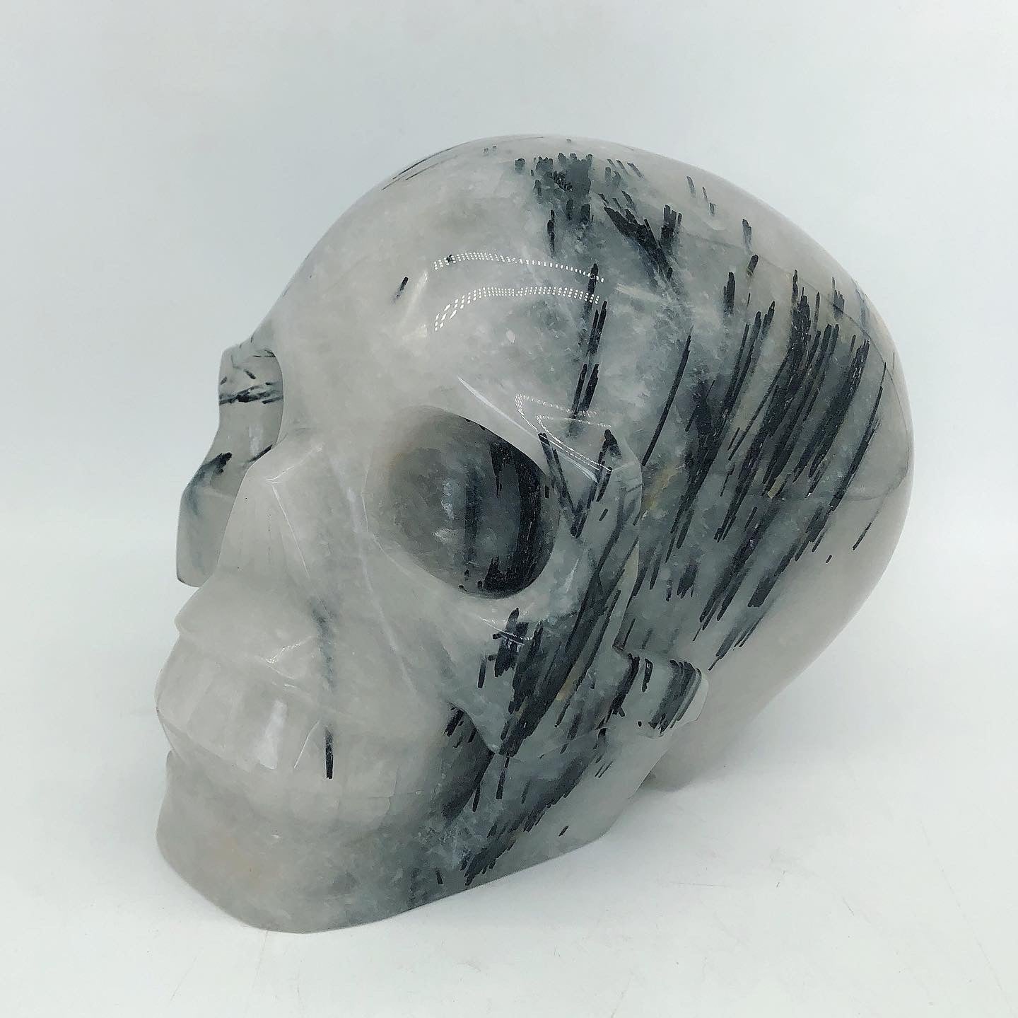 Black toumaline skull carving