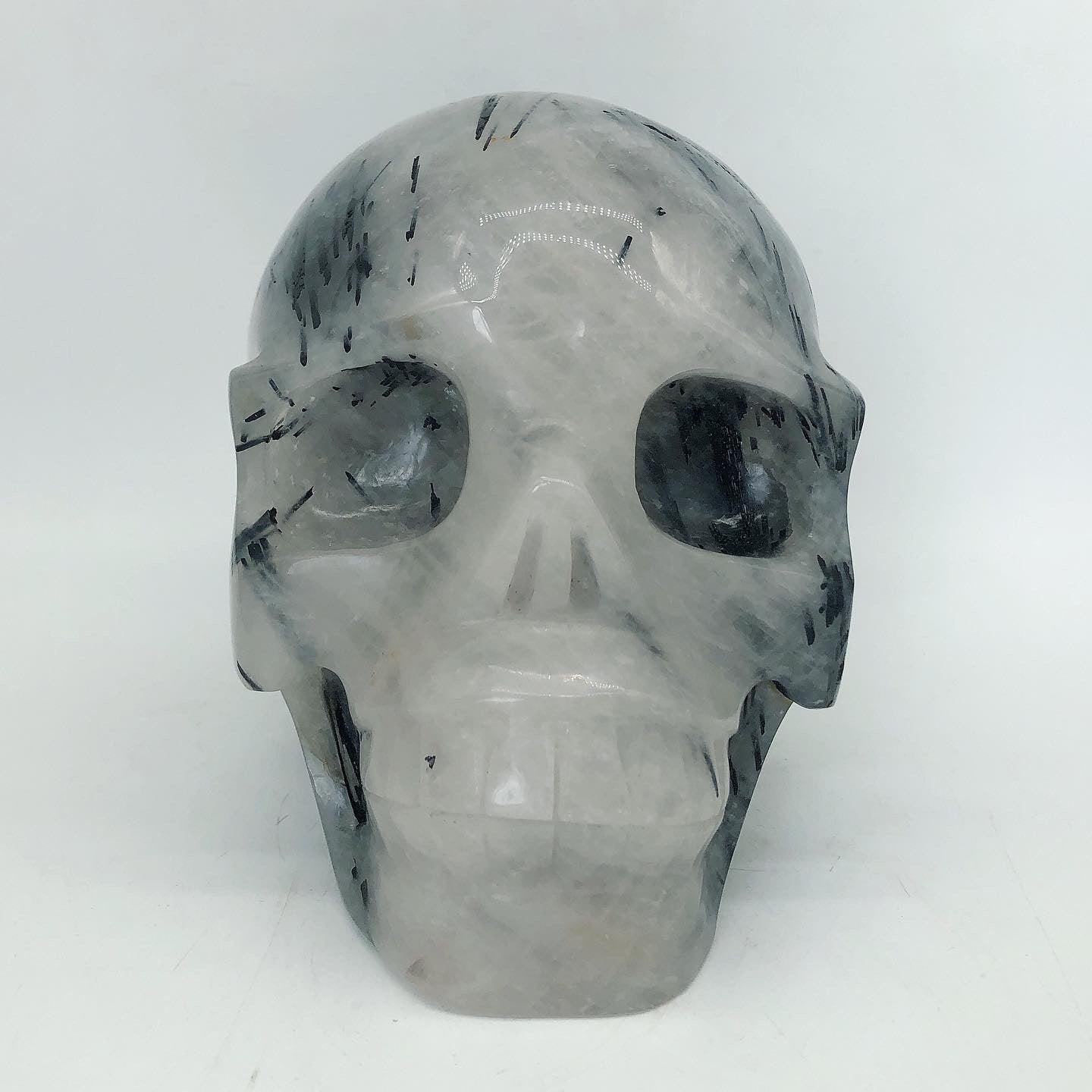 Black toumaline skull carving