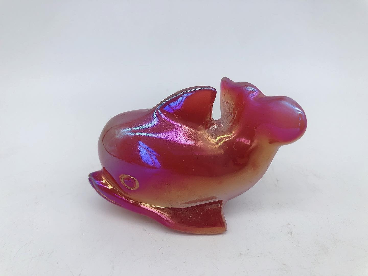 Aura dolphin carving