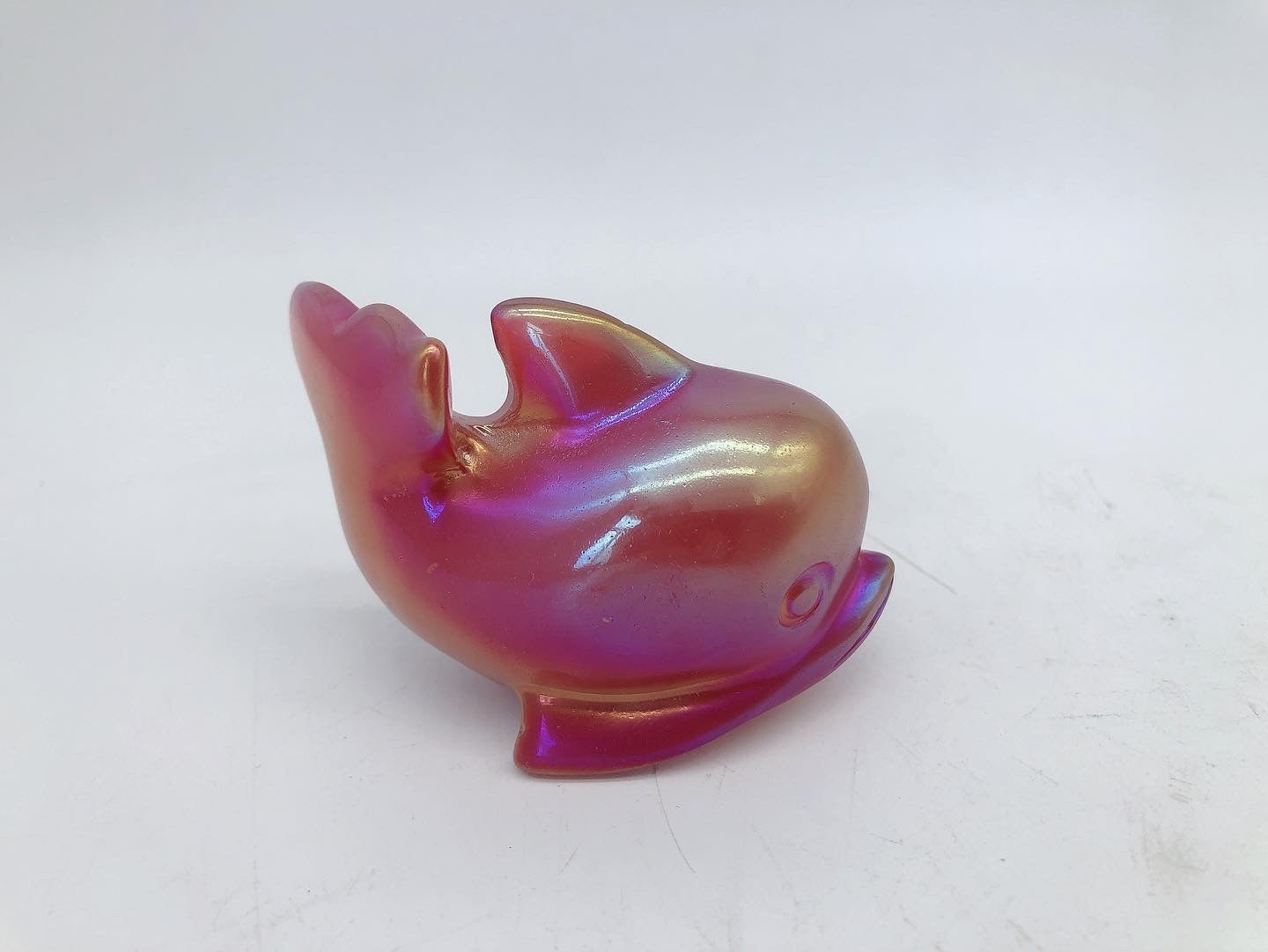 Aura dolphin carving