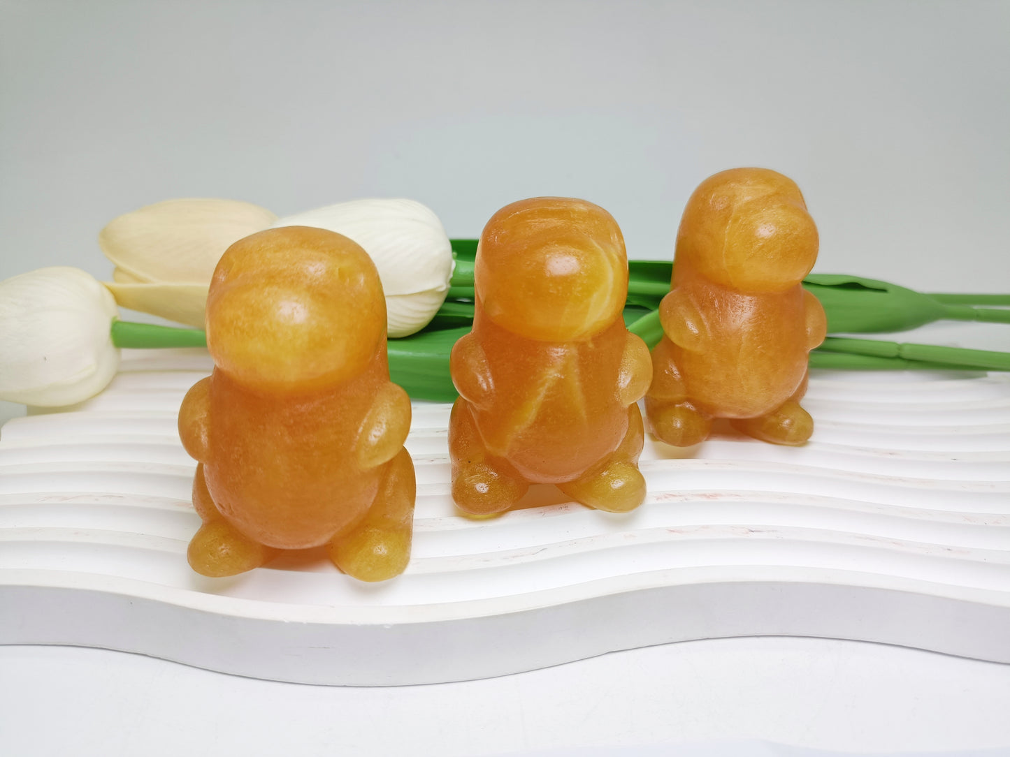 Orange calcite dinosaur