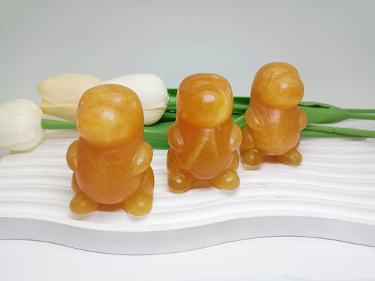 Orange calcite dinosaur