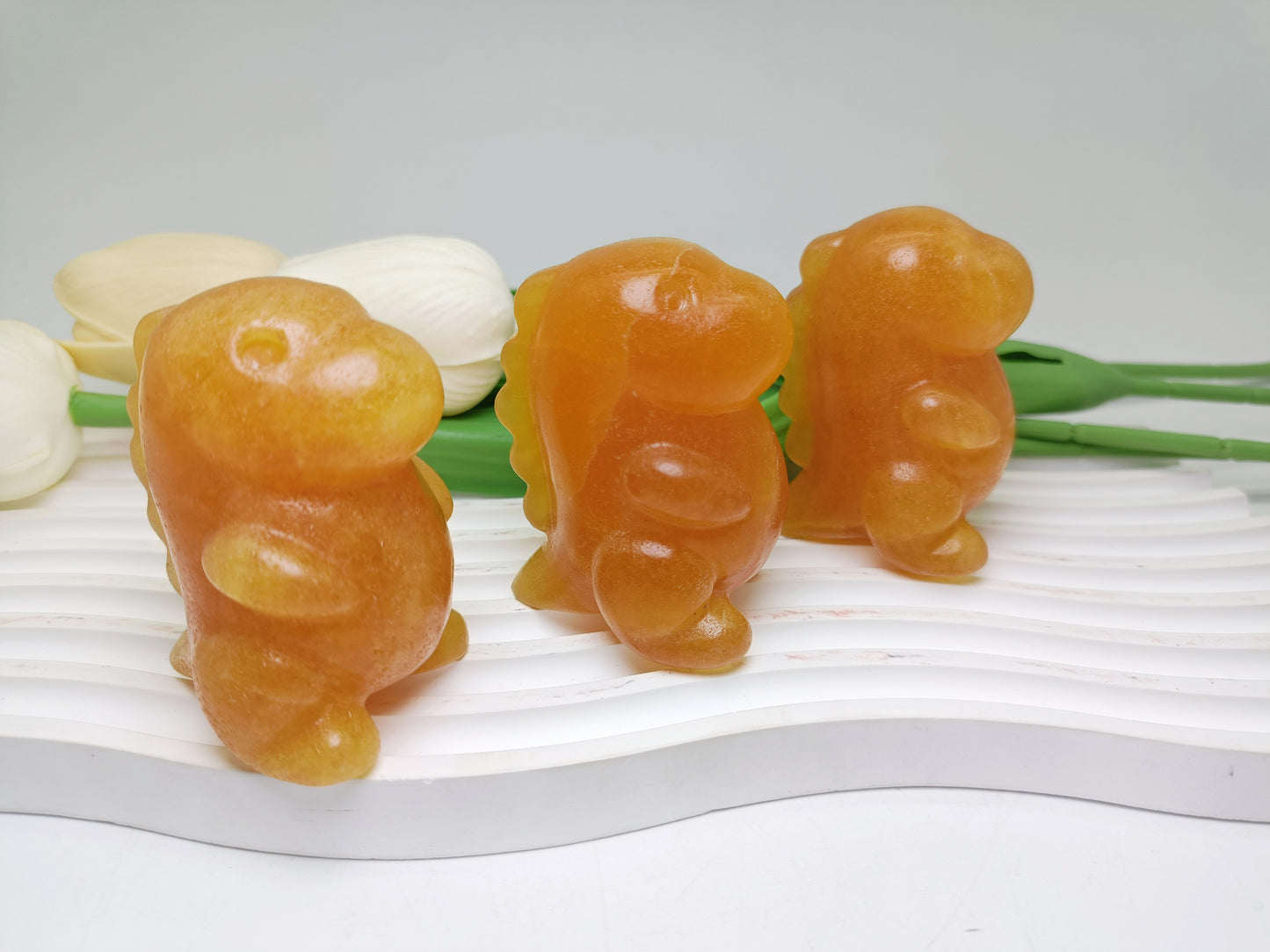 Orange calcite dinosaur