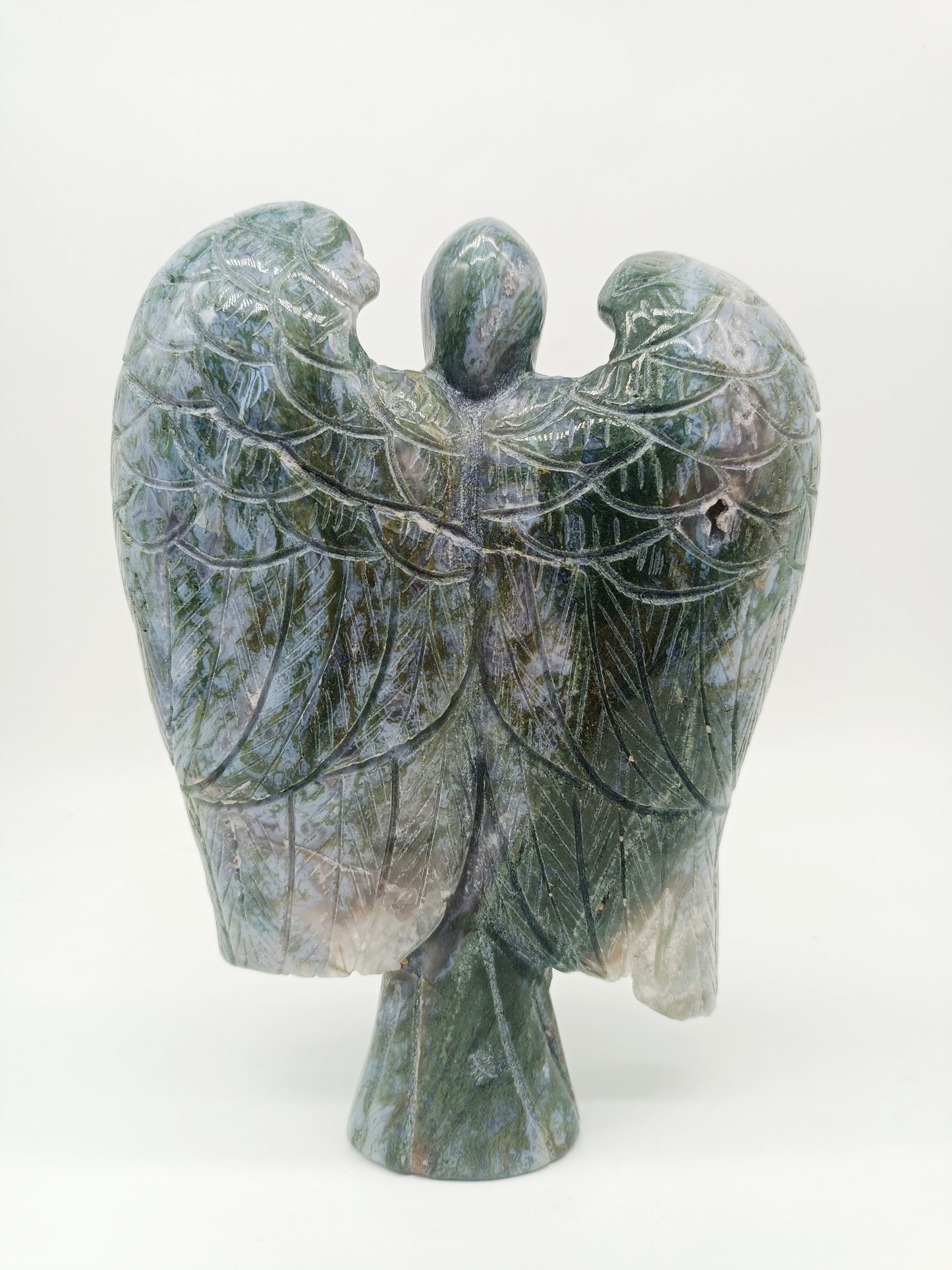 Moss agate angel carving