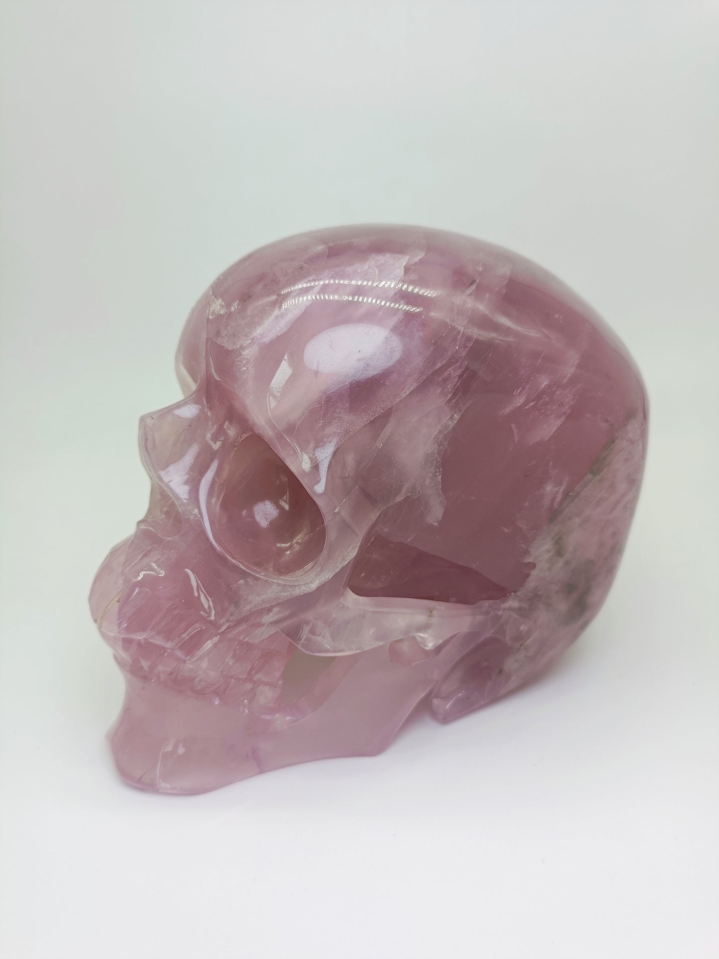 Rose quartz skull carving