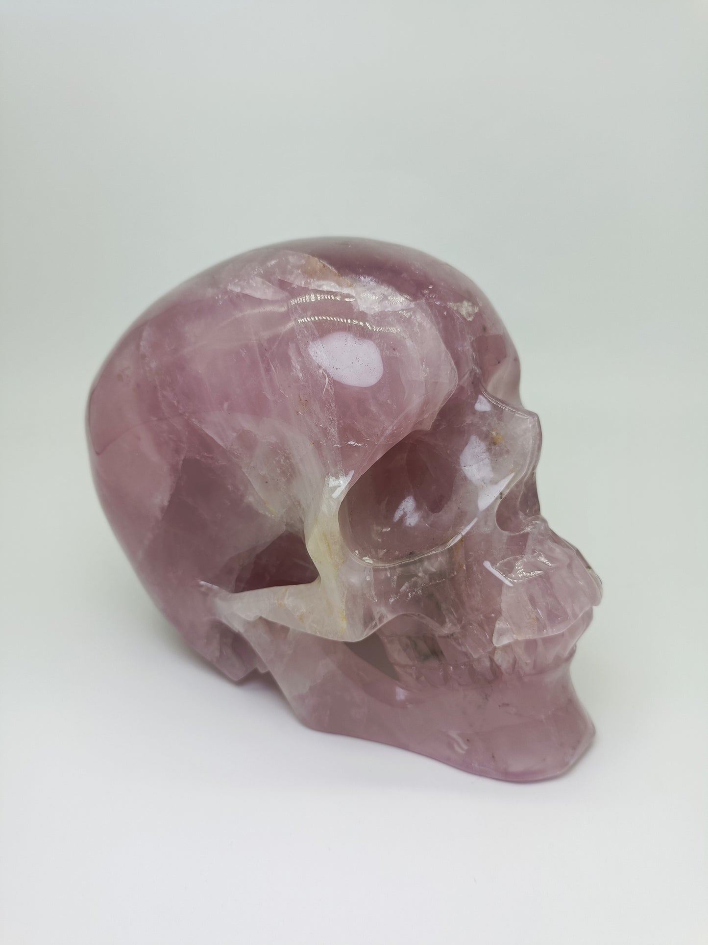 Rose quartz skull carving