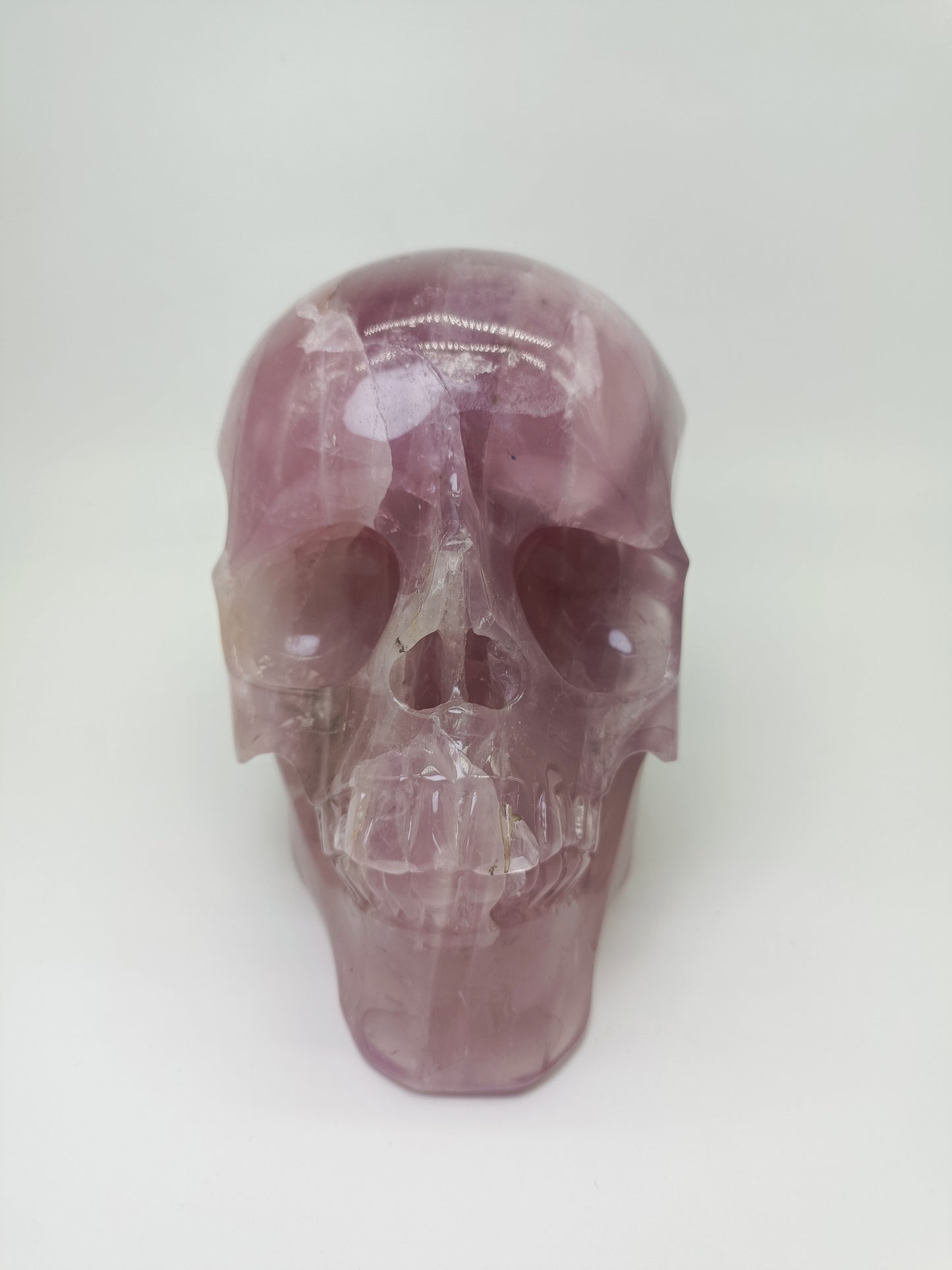 Rose quartz skull carving