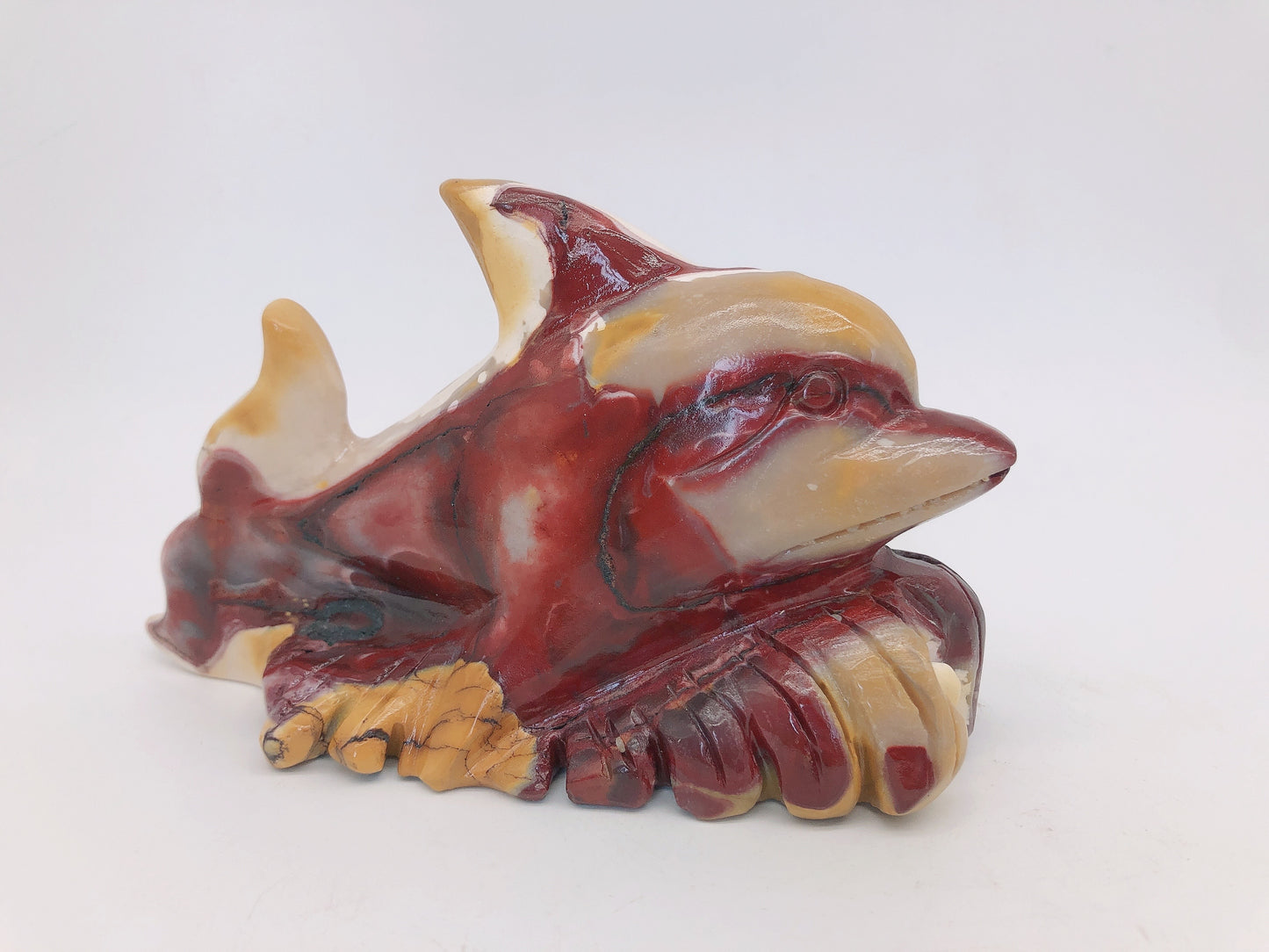 Mookite dolphin carving