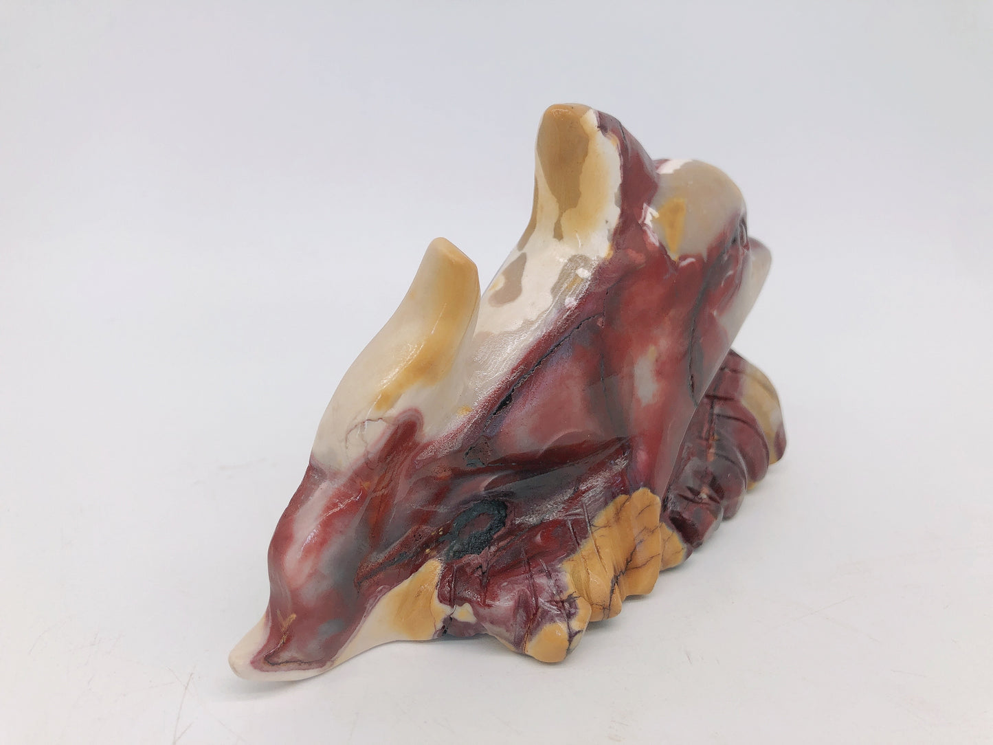 Mookite dolphin carving
