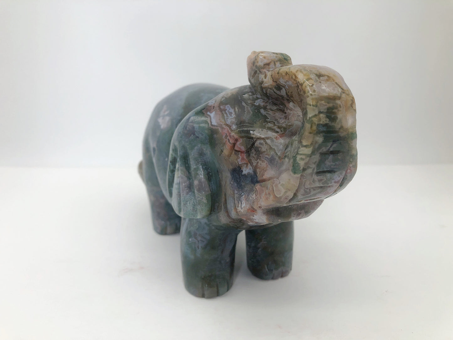Moss agate elephant carving
