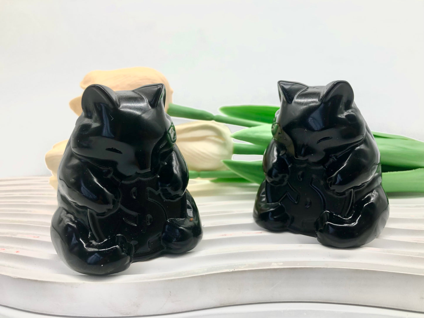 Black obsidian cat carving